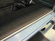 Con carpet under front seats